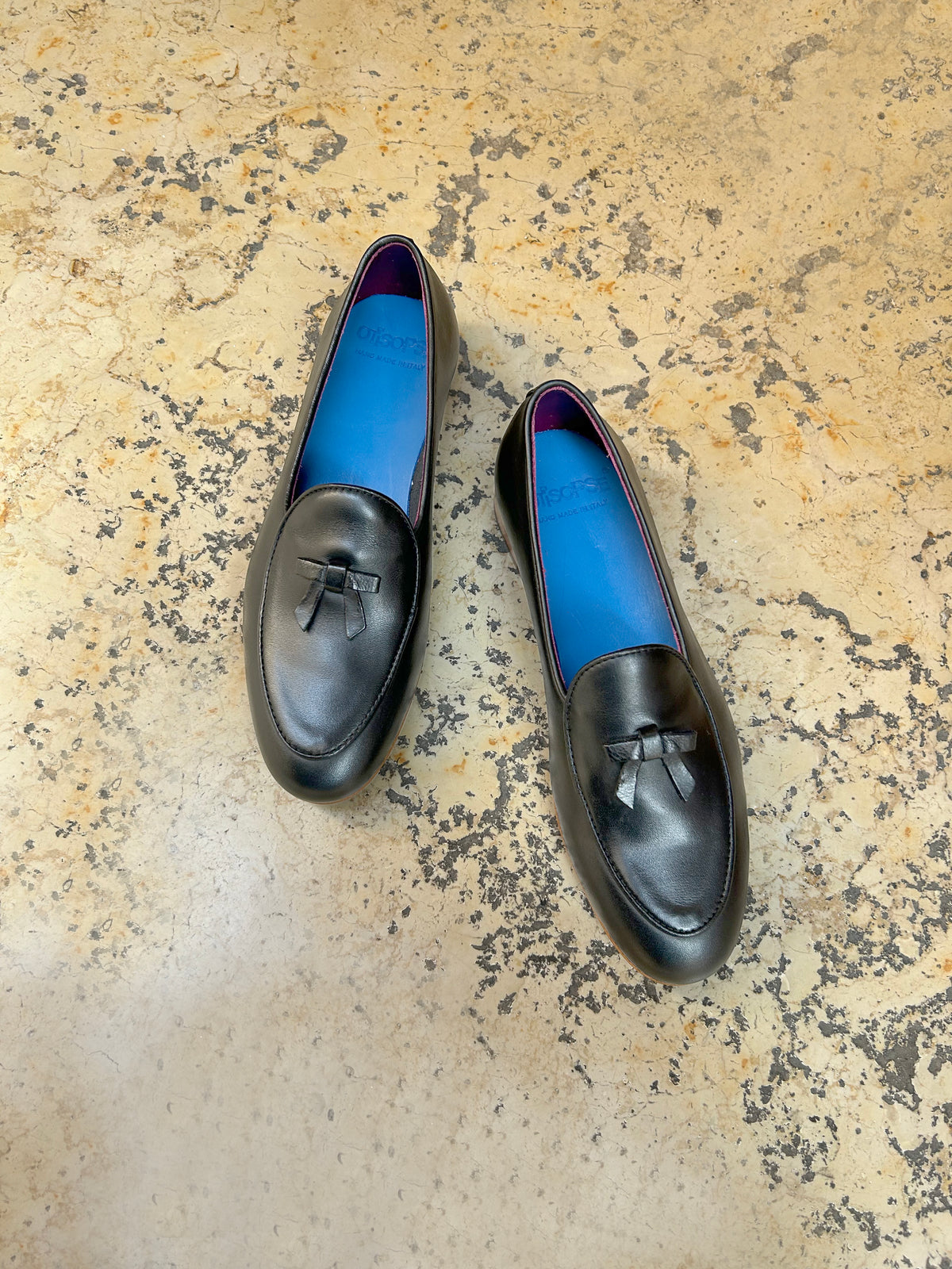 Black leather slippers