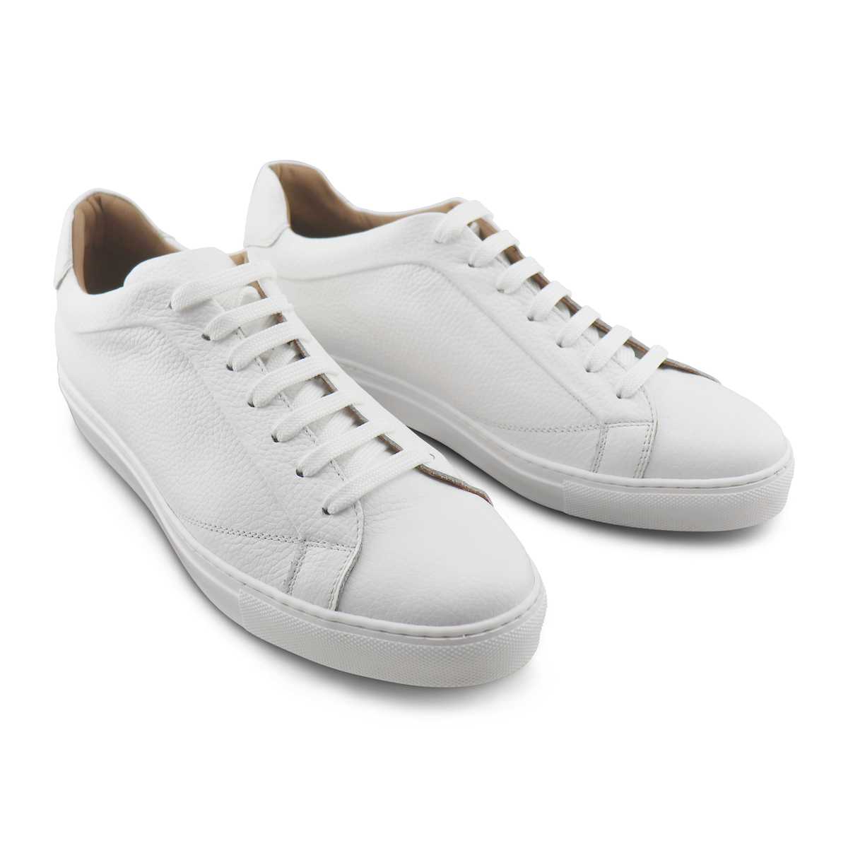 Sneaker bianche in pelle bottalata