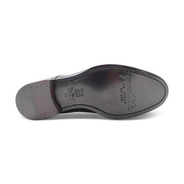 Scarpe con suola in cuoio cucita