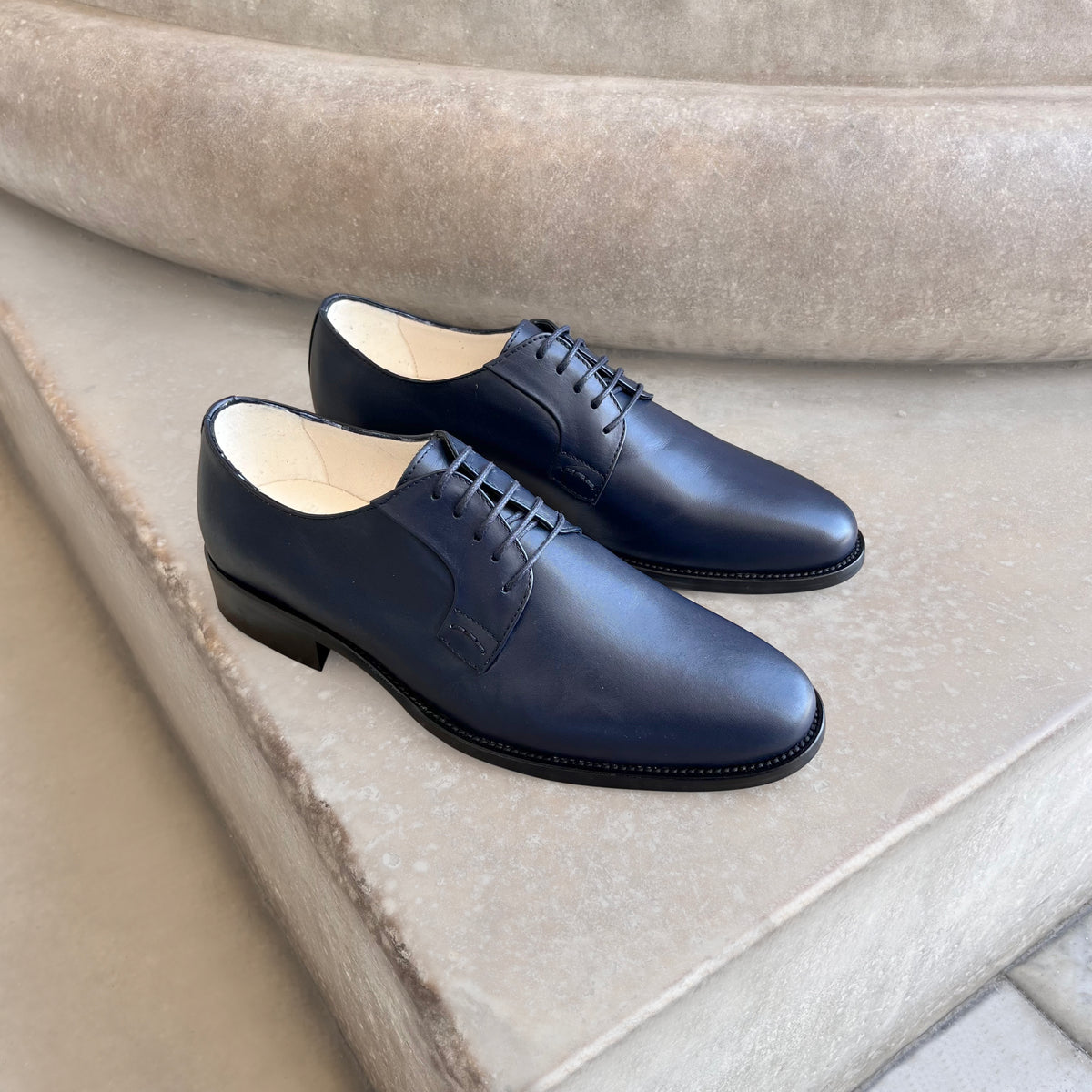 Derby in pelle blu