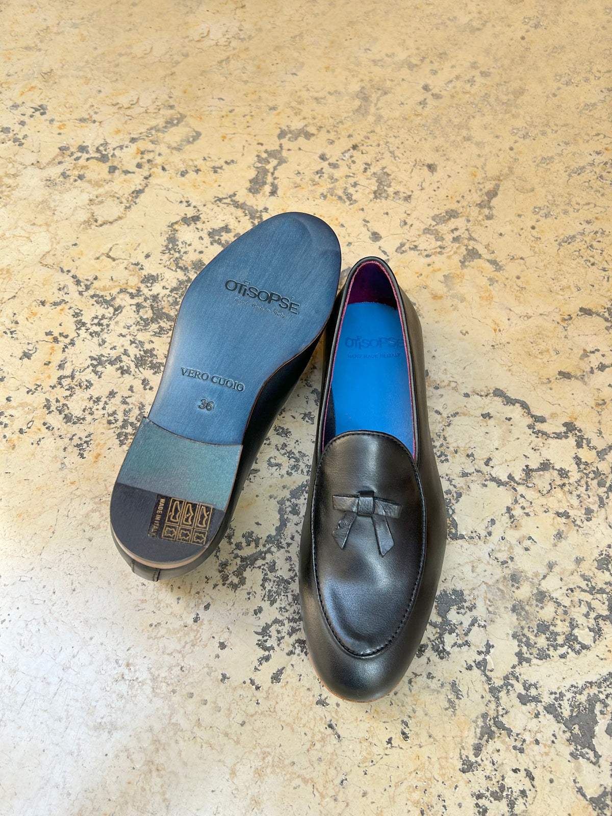 Black leather slippers