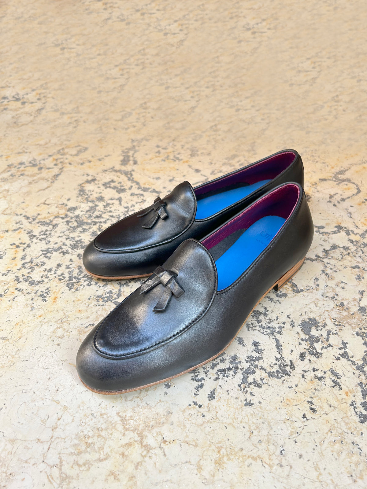 Black leather slippers